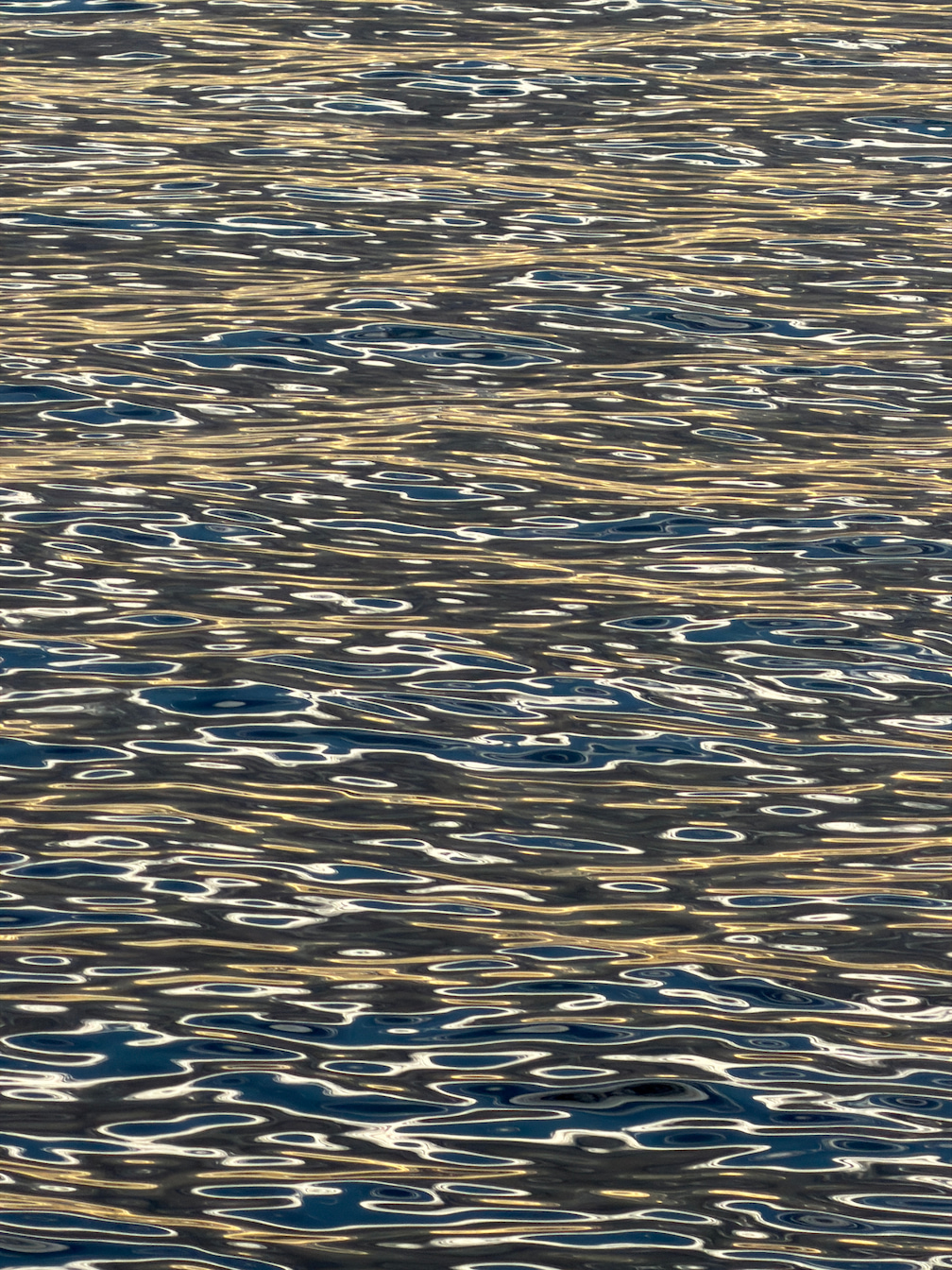 A close-up of water during sunset